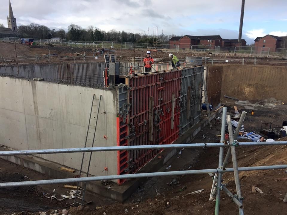 Reinforced concrete walls being constructed
